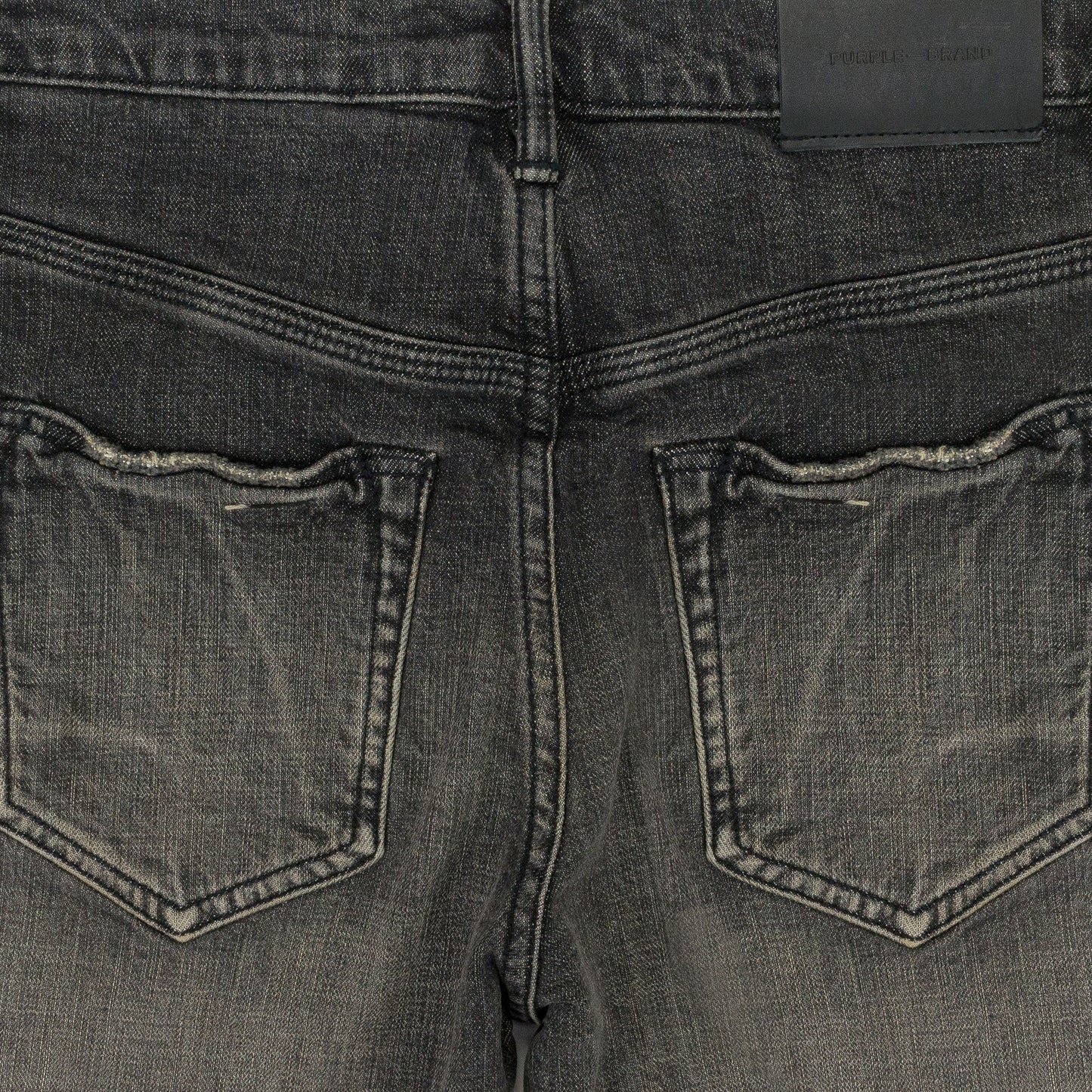 GREY DIRTY RESIN BLOWOUT SKINNY JEANS