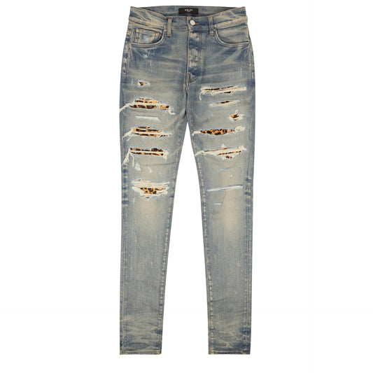 Amiri Leopard Distressed Thrasher Jeans - Clay/Indigo