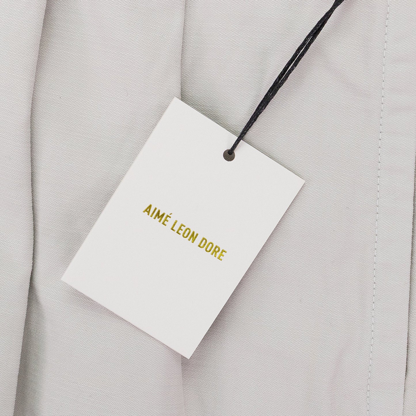 OFF-WHITE DOUBLE PLEATED TROUSERS