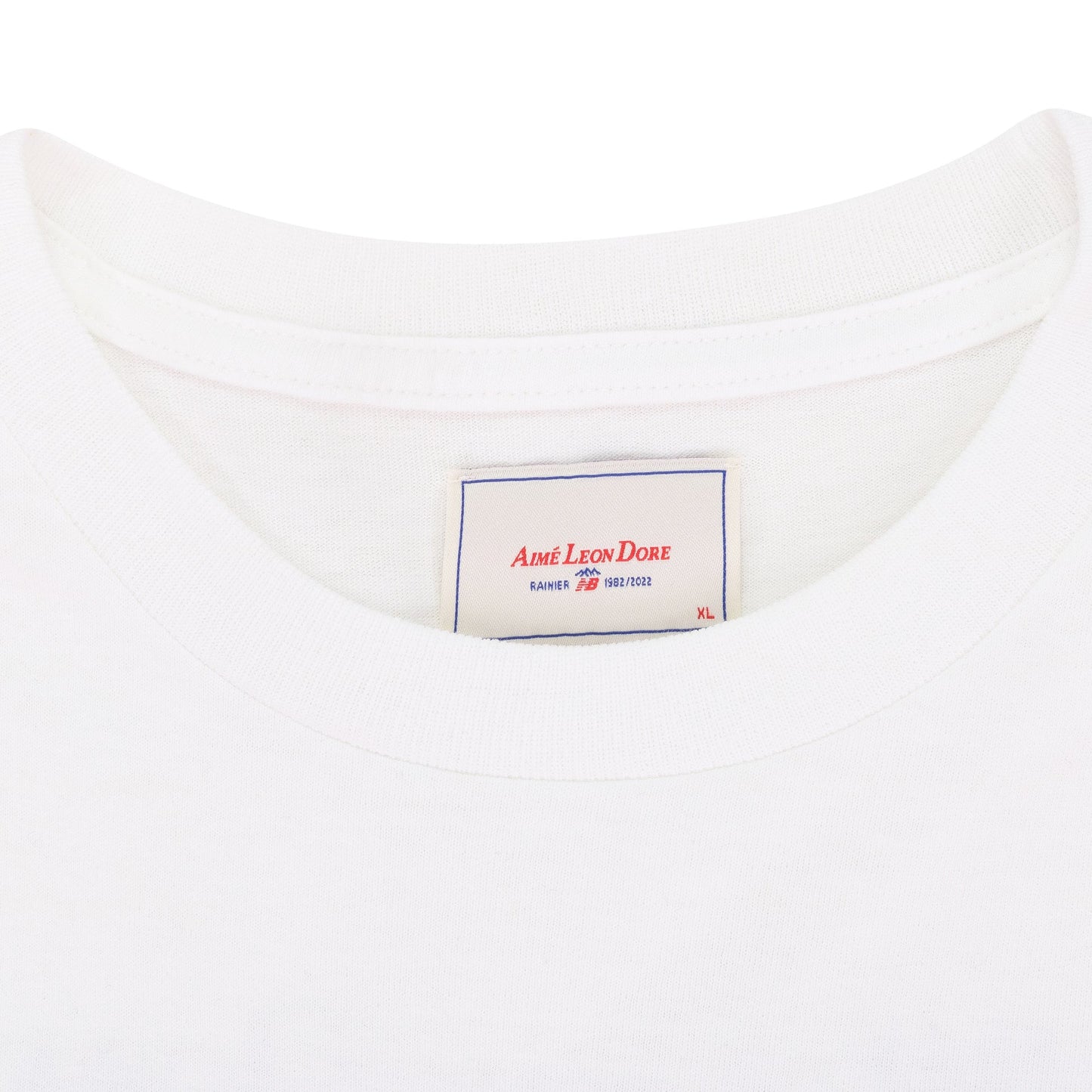 WHITE NEW BALANCE RAINIER '82 T-SHIRT