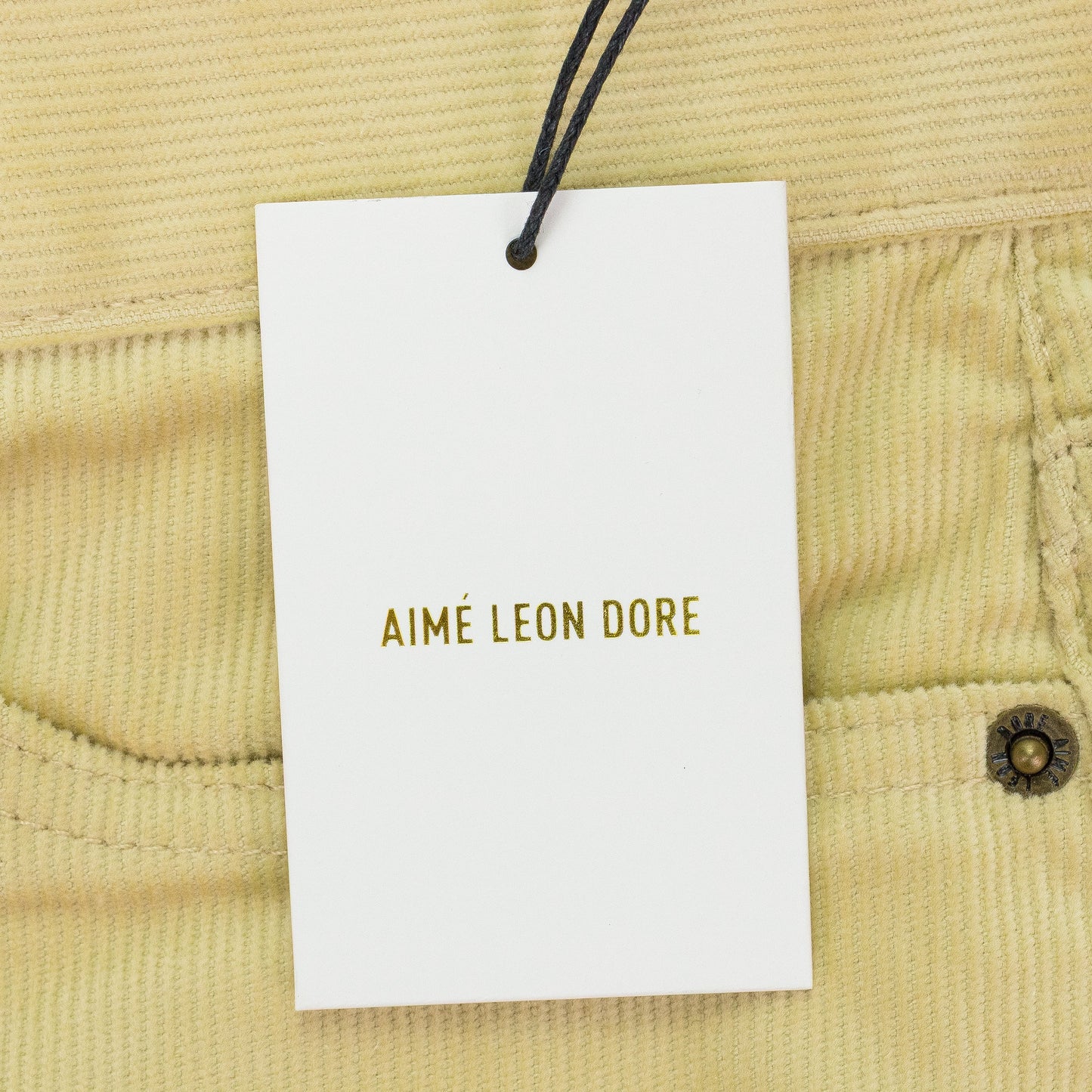 CREAM MICRO CORD RELAXED-FIT JEANS