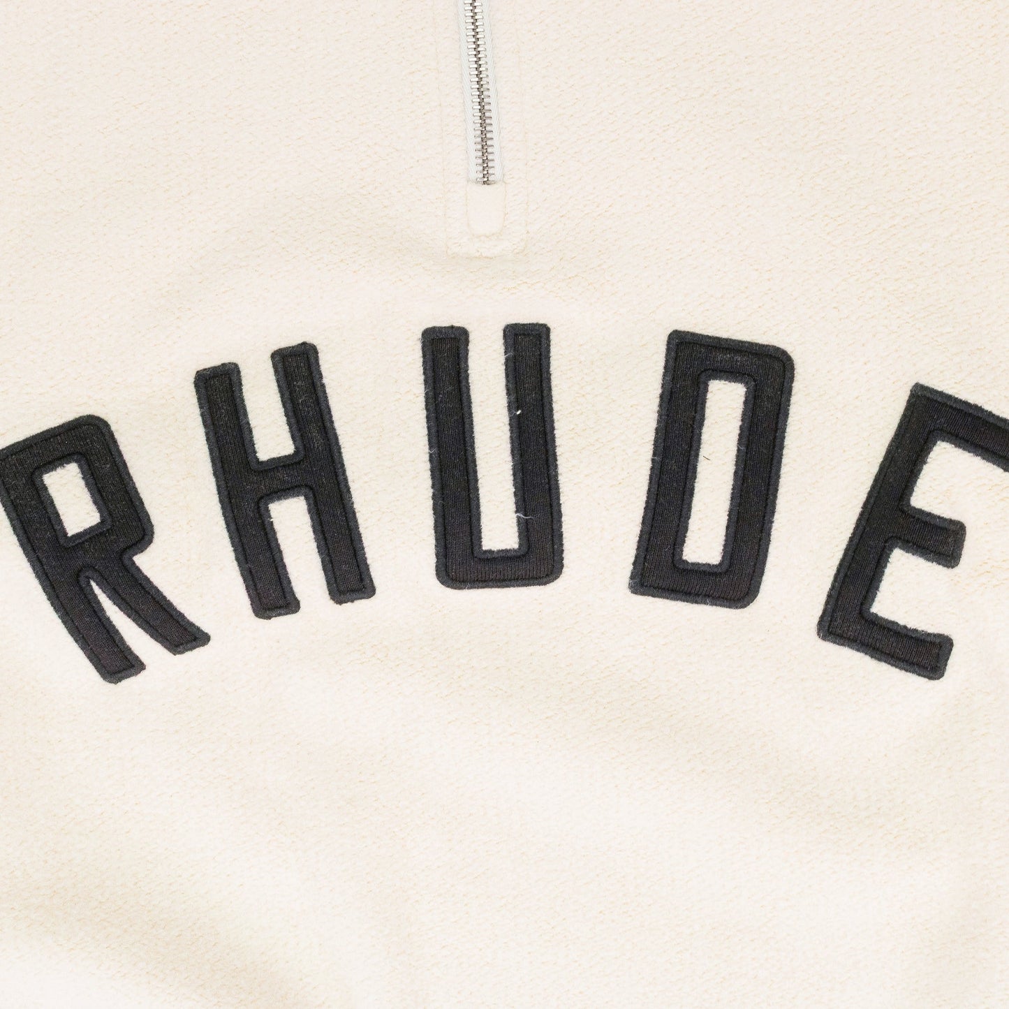 CREAM QUARTER ZIP VARSITY SWEATER
